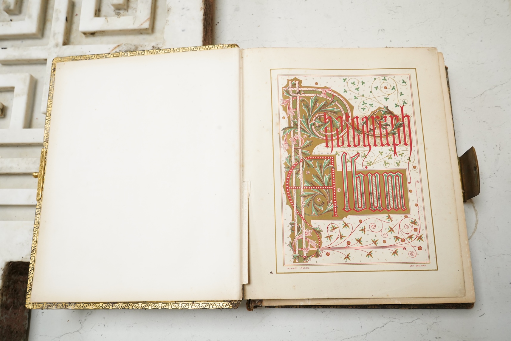 A Victorian malachite mounted amboyna family photograph album, 23cm x 30cm